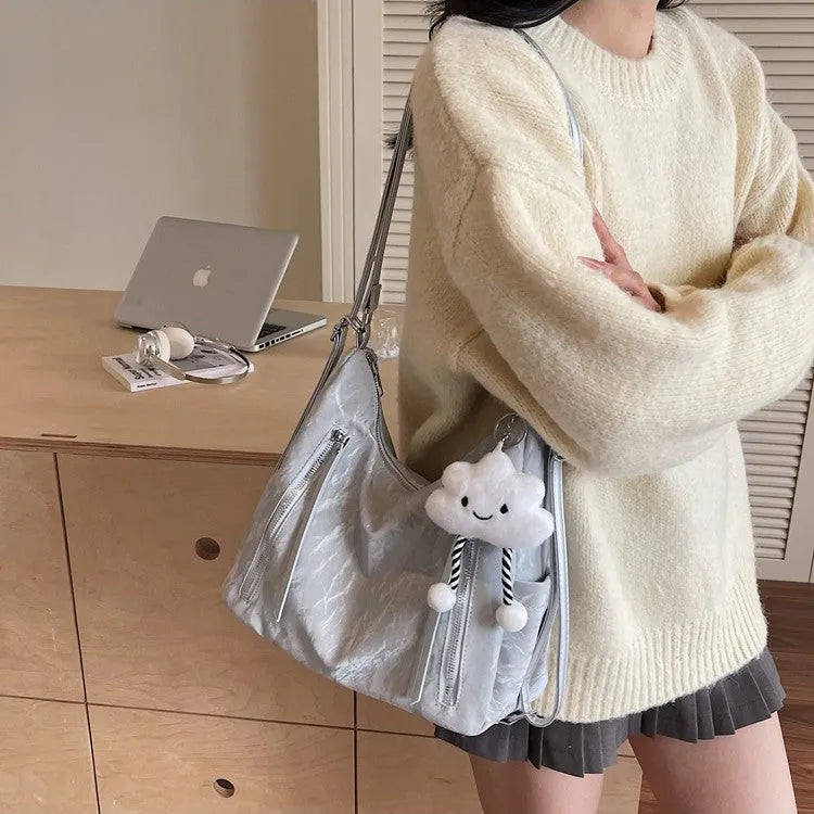 Women's soft PU backpack in four colour options with matching pendant