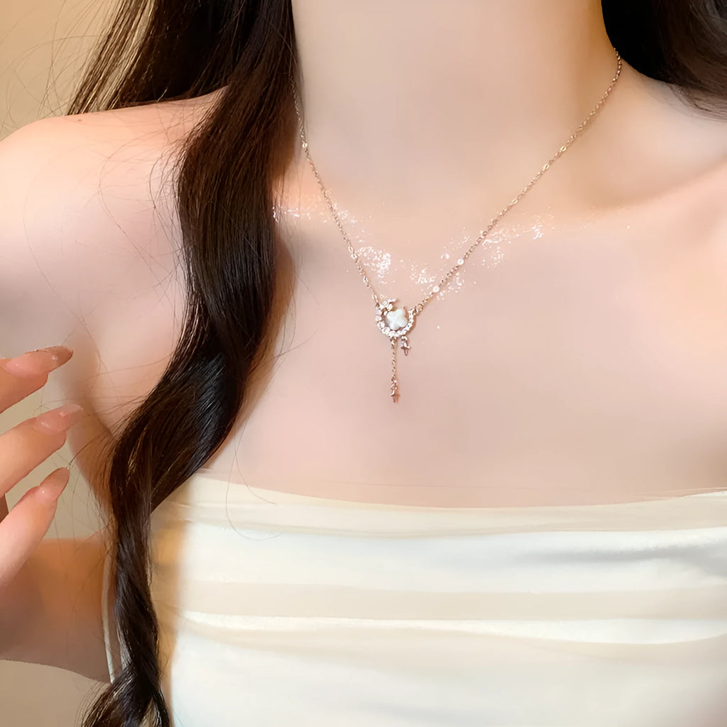 Gold star moon zirconium necklace on display with alloy pendant and adjustable chain