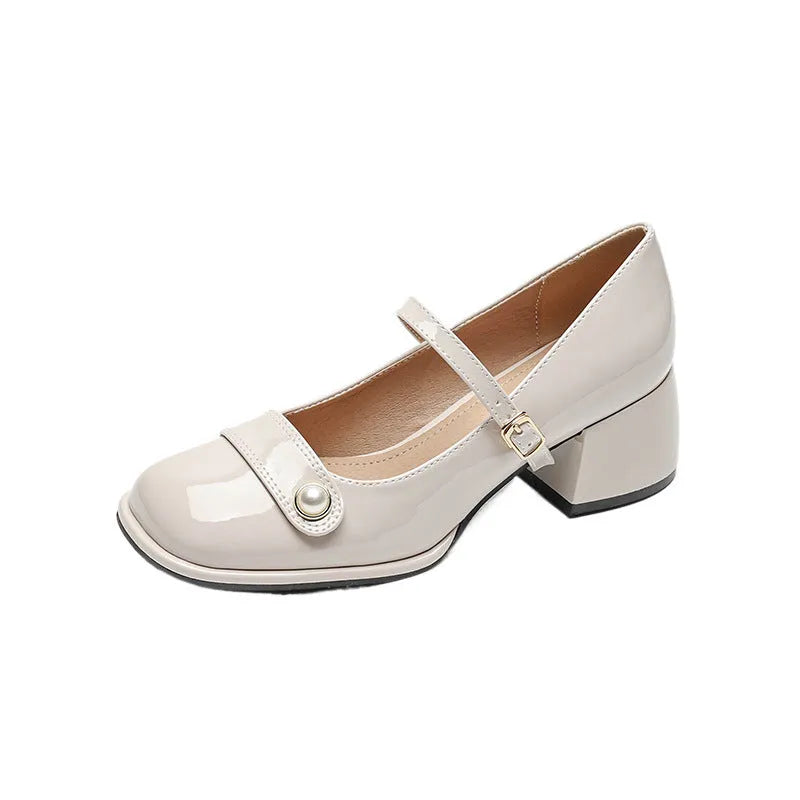 French style chunky heel ankle boots with patent leather upper, square toe, and buckle fastening