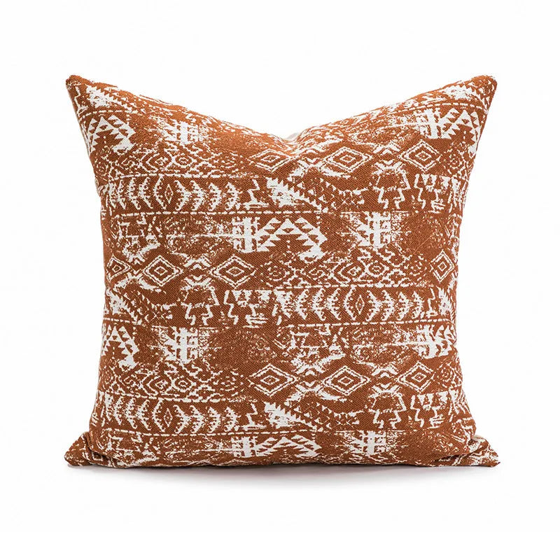 Solid colour decorative cushion on a sofa, showing its square shape and pp cotton filling.