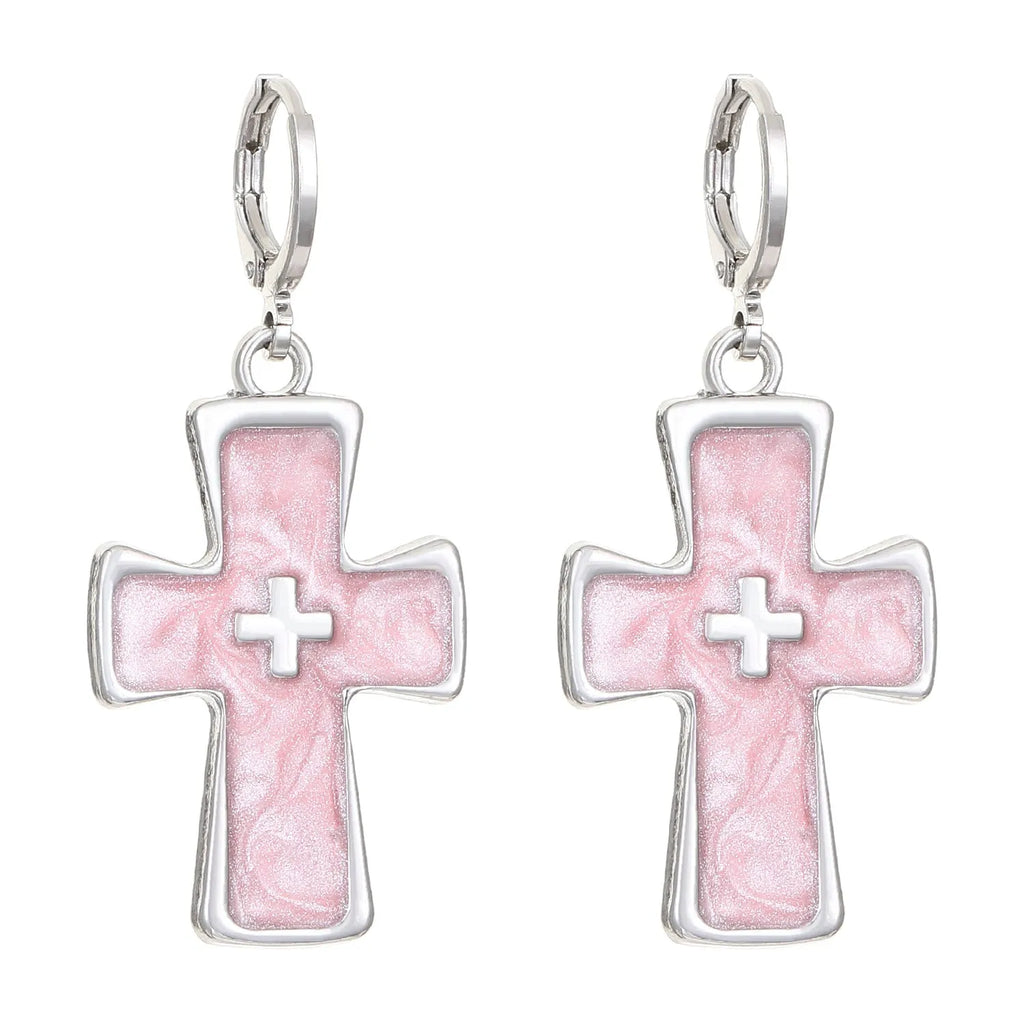 Women's alloy earrings showing cross, heart, and animal designs in white, black, and silver colour variations