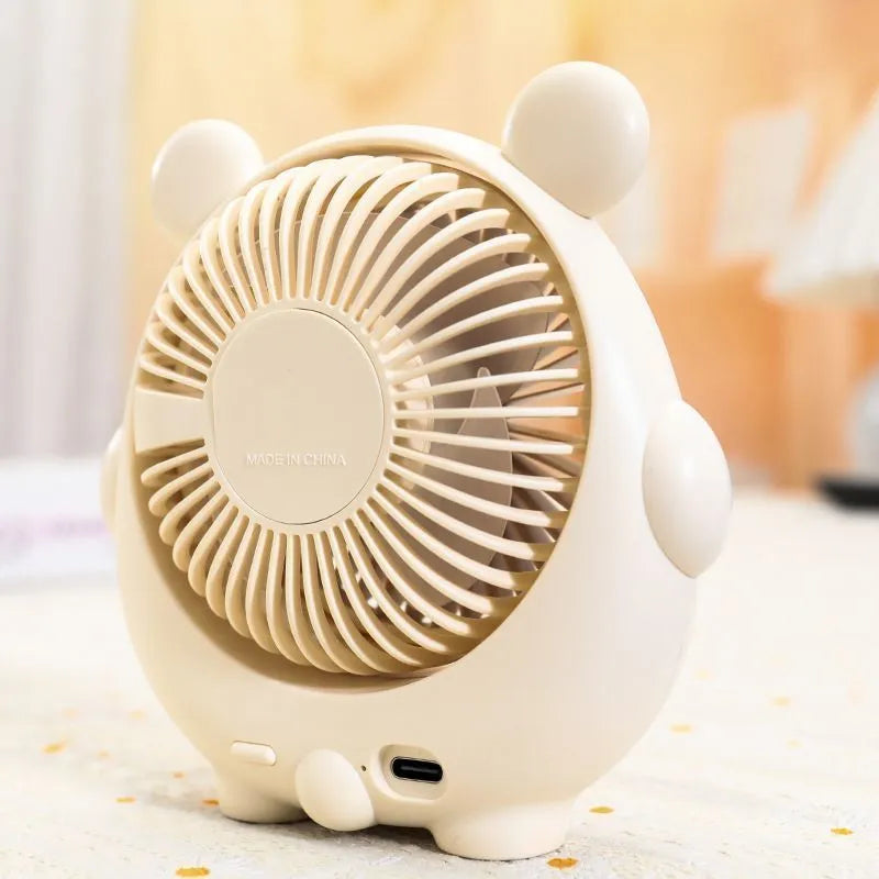 USB desktop fan with dog design showing three speed settings and lightweight plastic construction