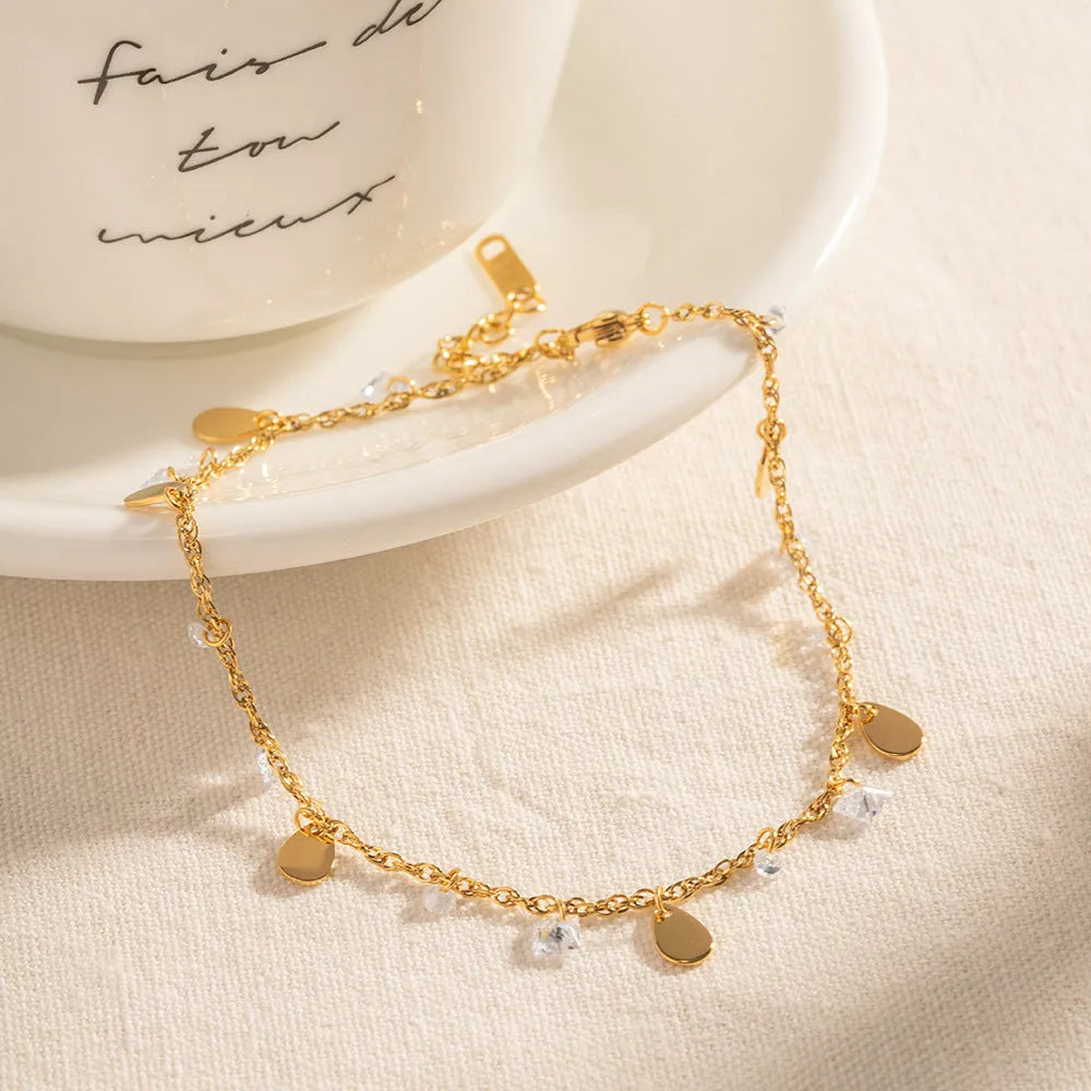 Women's stainless steel water drop tassel anklet with geometry shape design, colour JDAW2303012, on a white background
