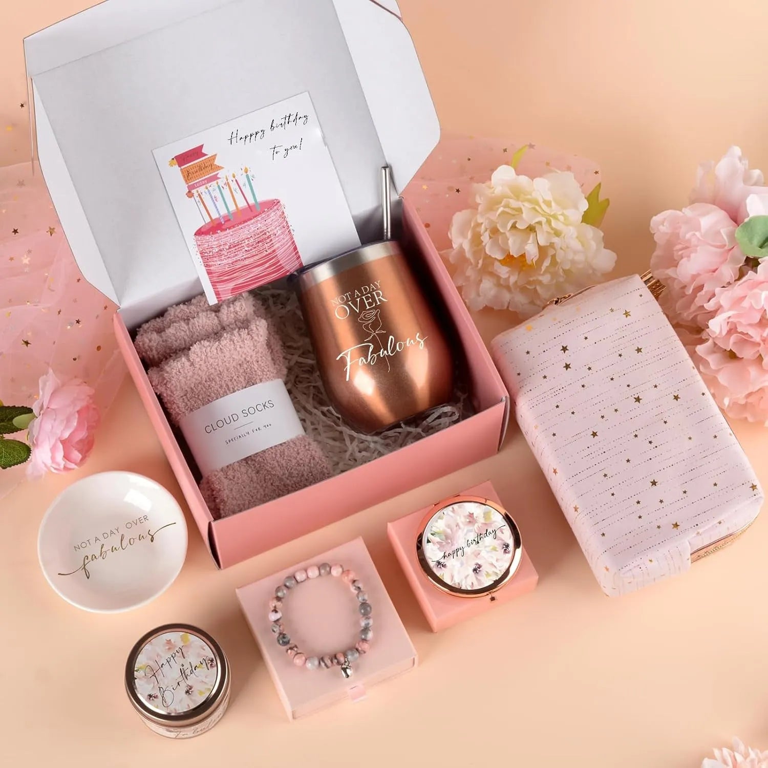 Boxed aromatherapy candle gift set with various modern soy wax designs including pink and sunflower themes.