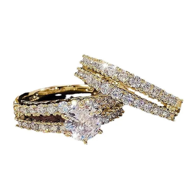 Two interchangeable geometric fashion rings with fully-jewelled round elements in gold, rose gold or silver colours
