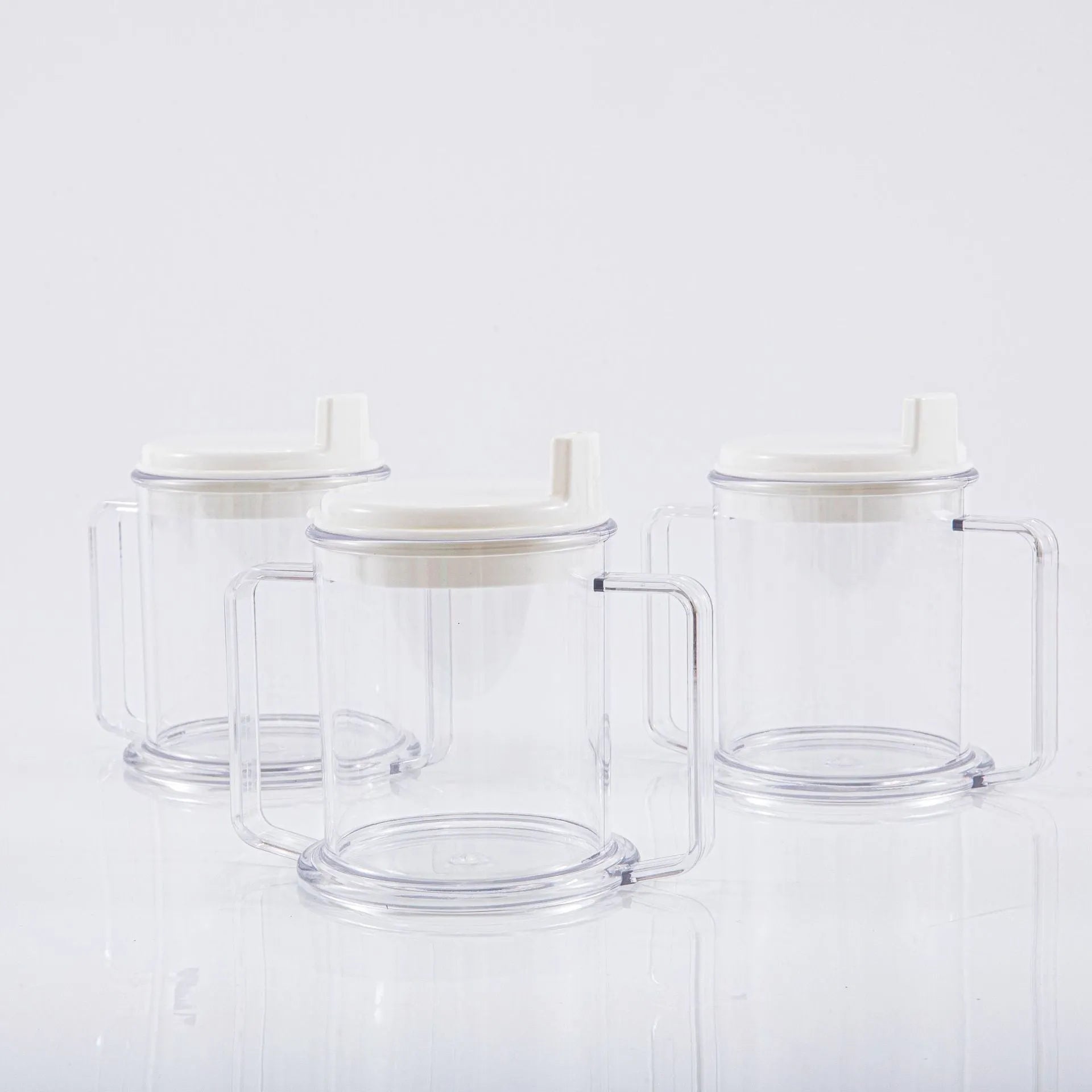 Transparent spill-proof drinking cup with modern design showing 14cm height