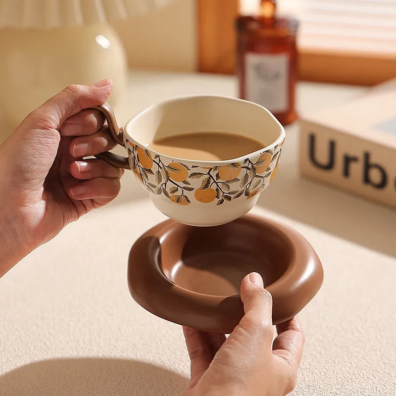 Antique style ceramic coffee cup and saucer set in retro luxury design