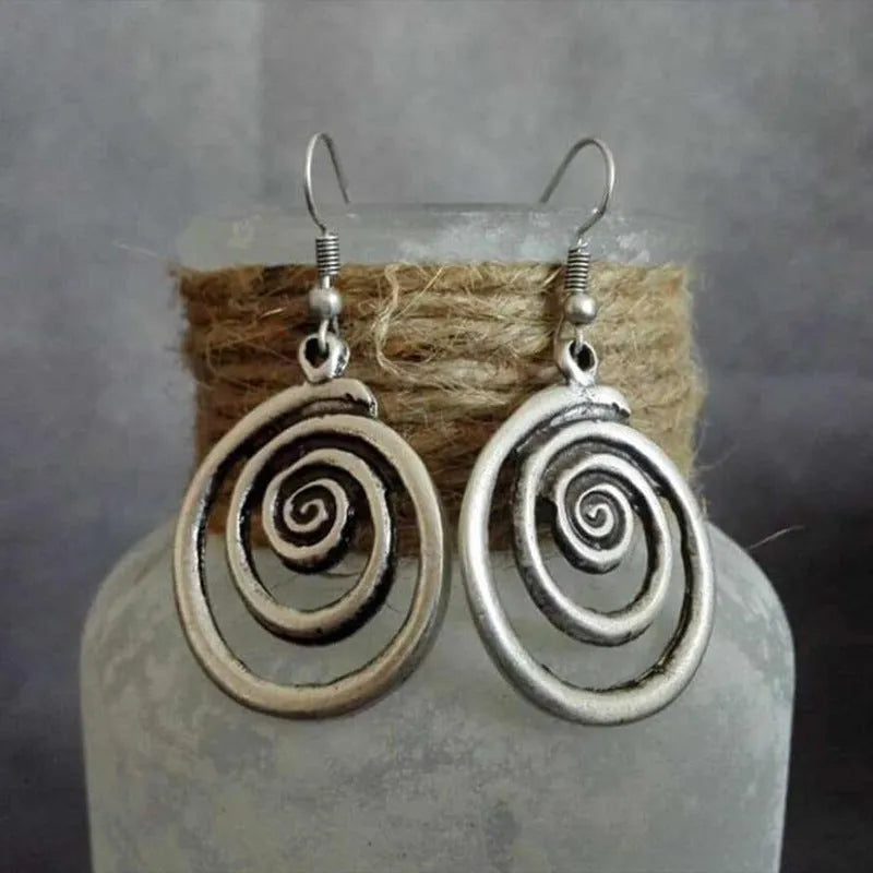 Silver geometric spiral distressed earrings with retro national style design measuring 2.6*5cm