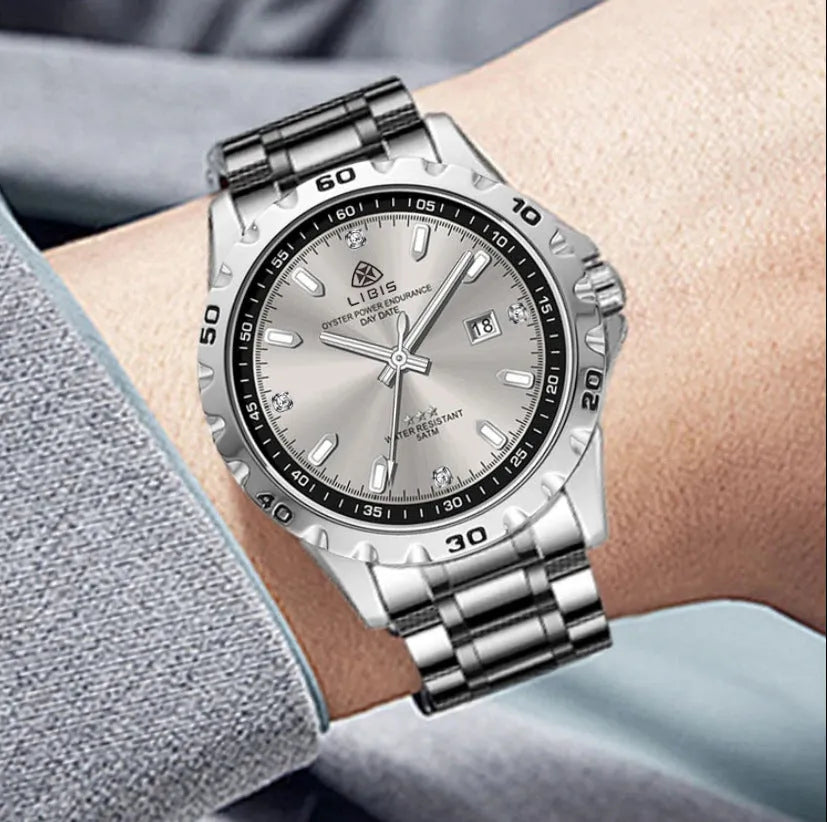 Men's silver stainless steel quartz watch with luminous hands on black or grey strap
