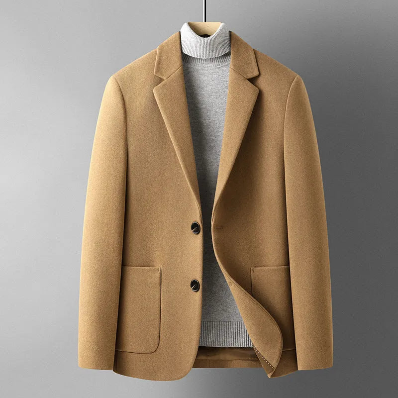 Men's slim fit wool suit jacket in a grey colour, showing the tailored silhouette and front button closure.