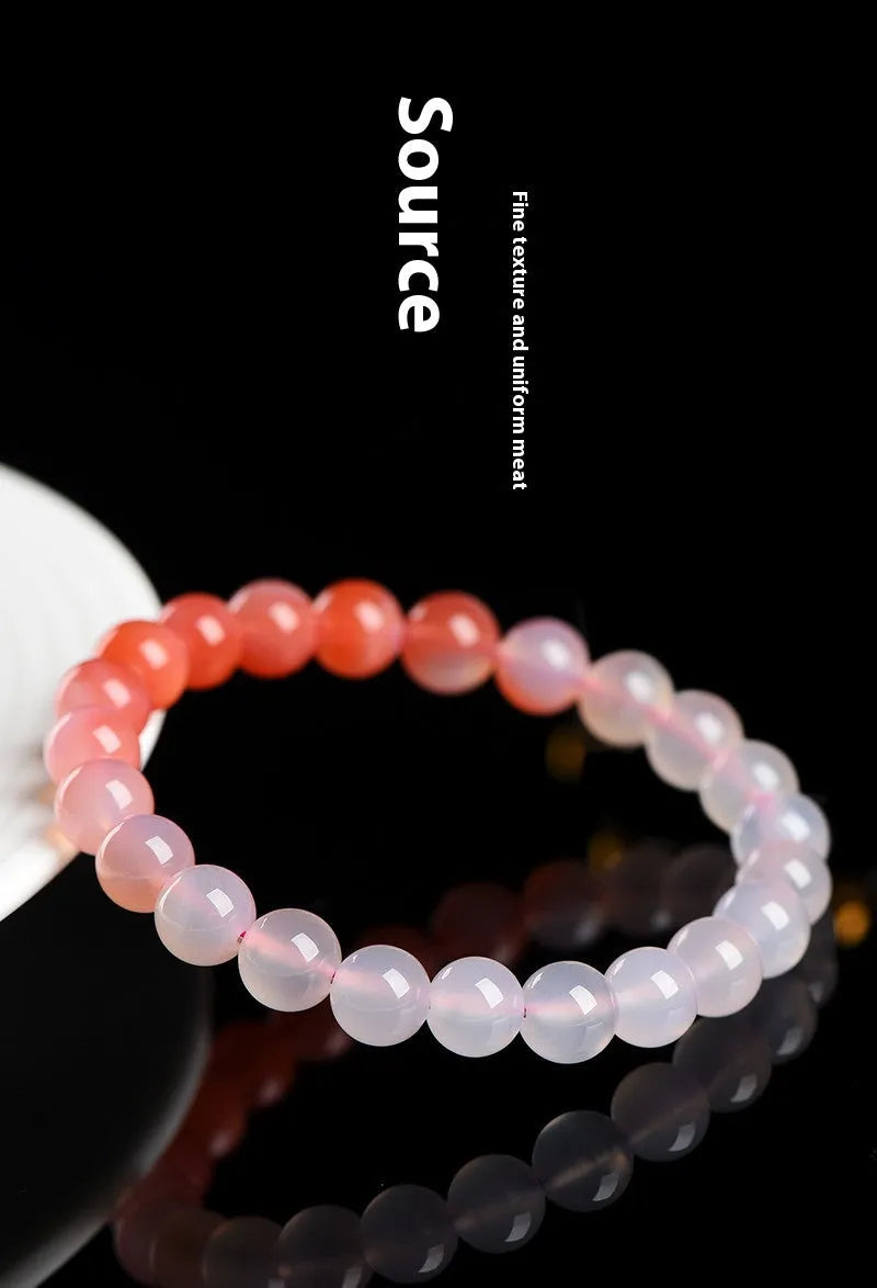 Natural gradient Yanyuan agate bracelet with geometric beads in a salt source colour, shown with size options.