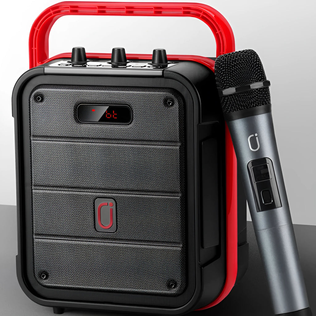 MS62AI portable Bluetooth speaker with wireless microphone on a table showing knob controls.