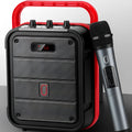 MS62AI portable Bluetooth speaker with wireless microphone on a table showing knob controls.