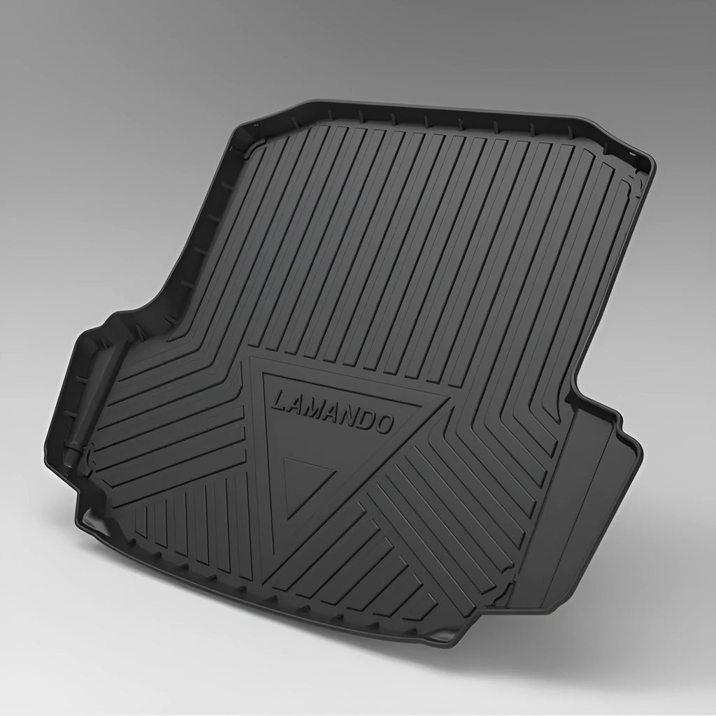 Black carbon fibre pattern TPE car boot liner mat fitted in a hatchback trunk.