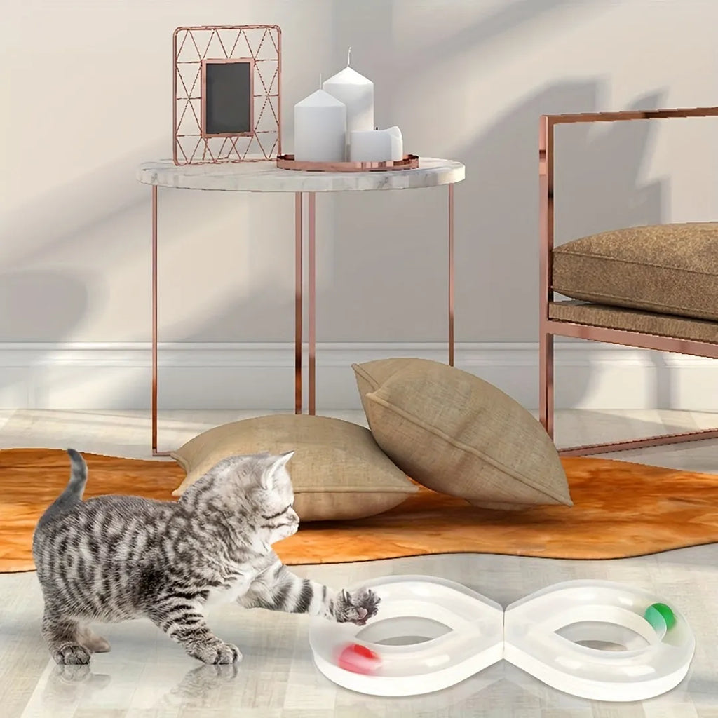 Blue and white plastic cat toy turntable track with a ball and a separate teasing stick.
