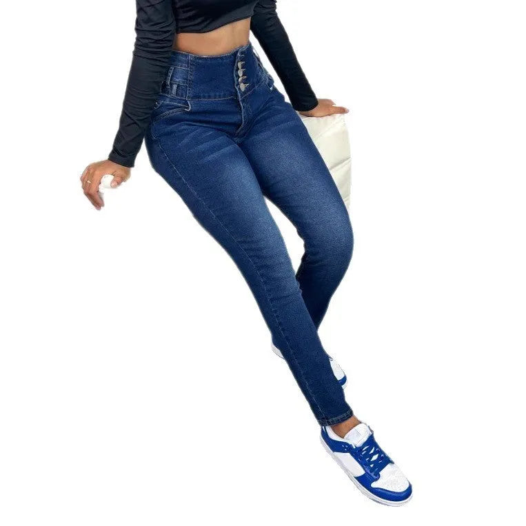Women's dark blue straight-leg denim trousers with front button fastening showing skinny fit