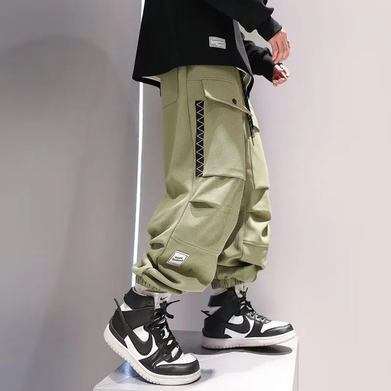 Plus-sized high waist drawstring big pocket teen trousers in black and green, size M to XXXL