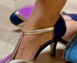 Women's round toe high heel shoe with a buckle strap, shown in a two-tone colour.