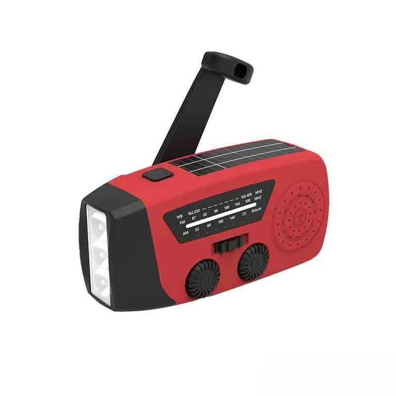 Red rechargeable hand radio torch with built-in speaker and USB interface, compact ABS body, emergency disaster prevention device
