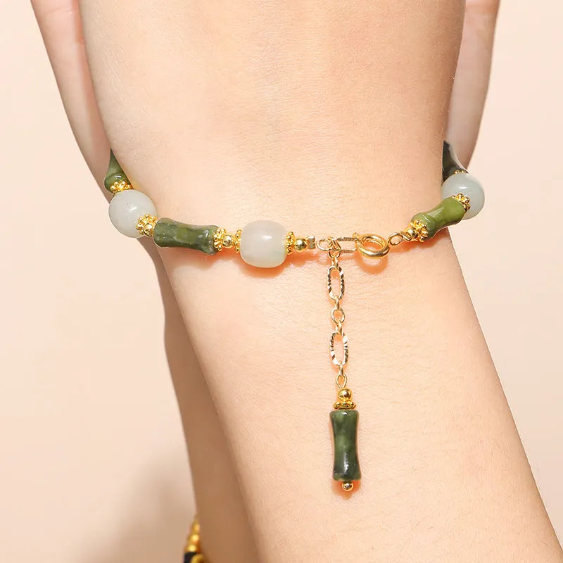 Crystal agate design bracelet with natural pink crystal and shape transfer beads on white background