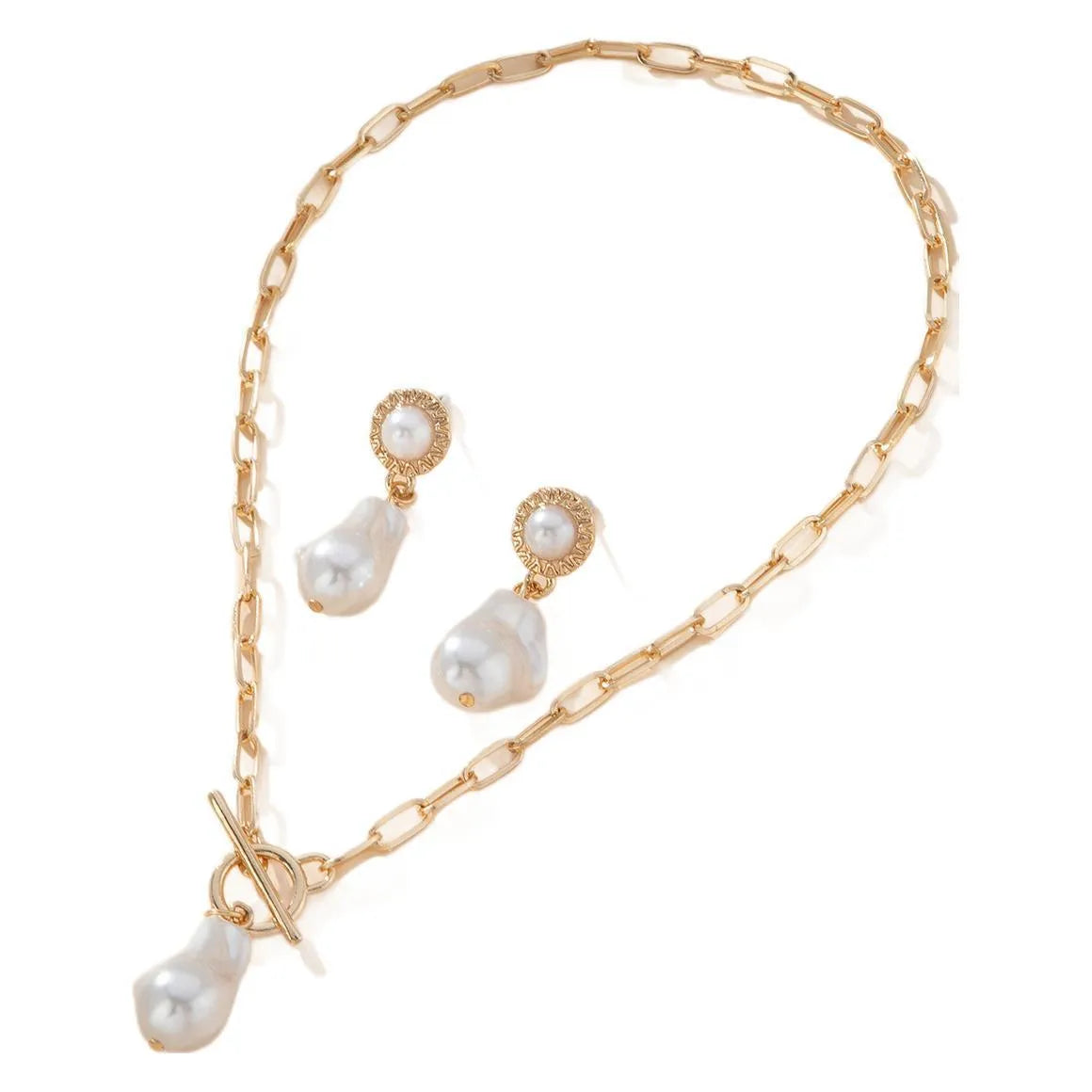 Gold tone baroque pearl pendant necklace and matching ear stud set on display