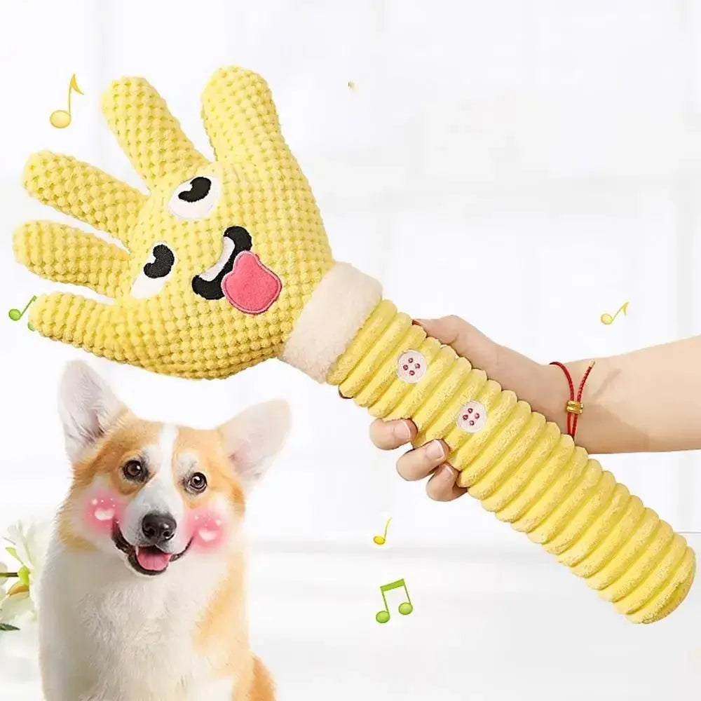 Yellow palm-shaped plush dog teething toy with squeaker for puppies