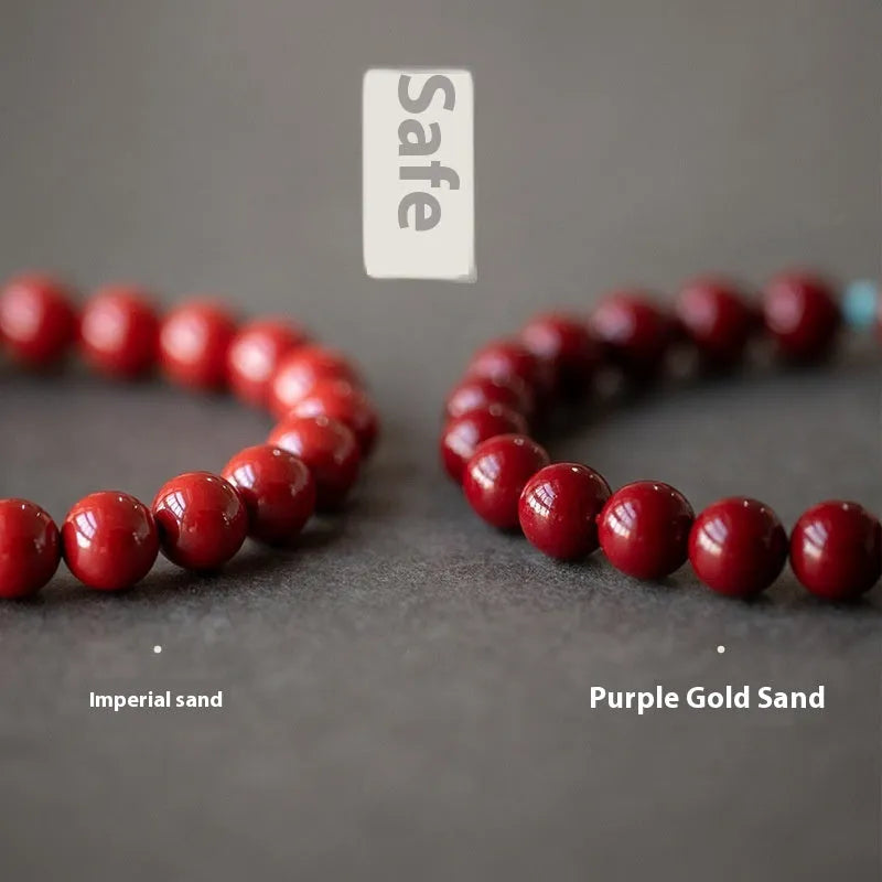 Purple Gold Sand cinnabar bracelet with geometric ellipse beads in 6mm, 8mm, or 10mm sizes on a wrist.