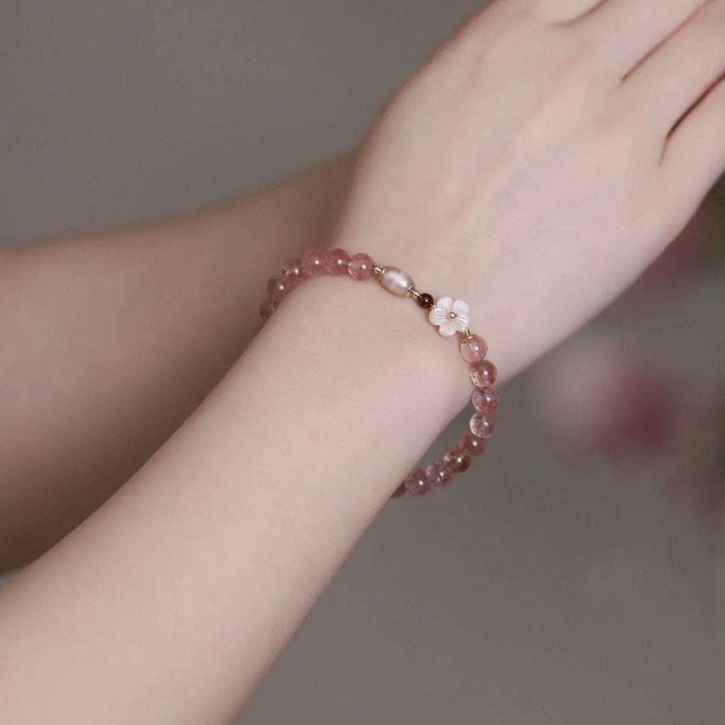 Strawberry quartz crystal bracelet with peach blossom flower charm and adjustable clasp