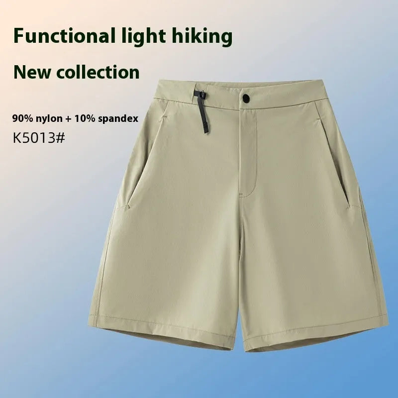 Men's quick-drying sports shorts in khaki colour with elastic waistband.