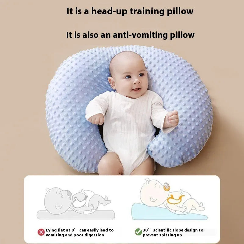Split-shaped nursing pillow with removable cover in light blue colour for breastfeeding support and spill prevention