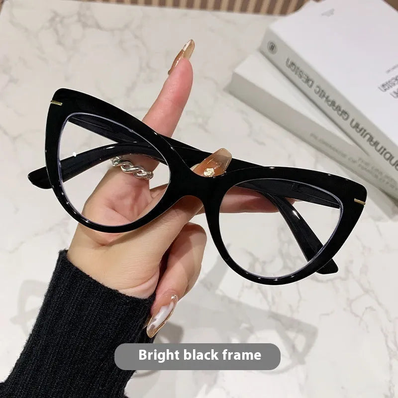 Women's large frame cat's eye reading glasses with dragon and phoenix decorations on the temples.