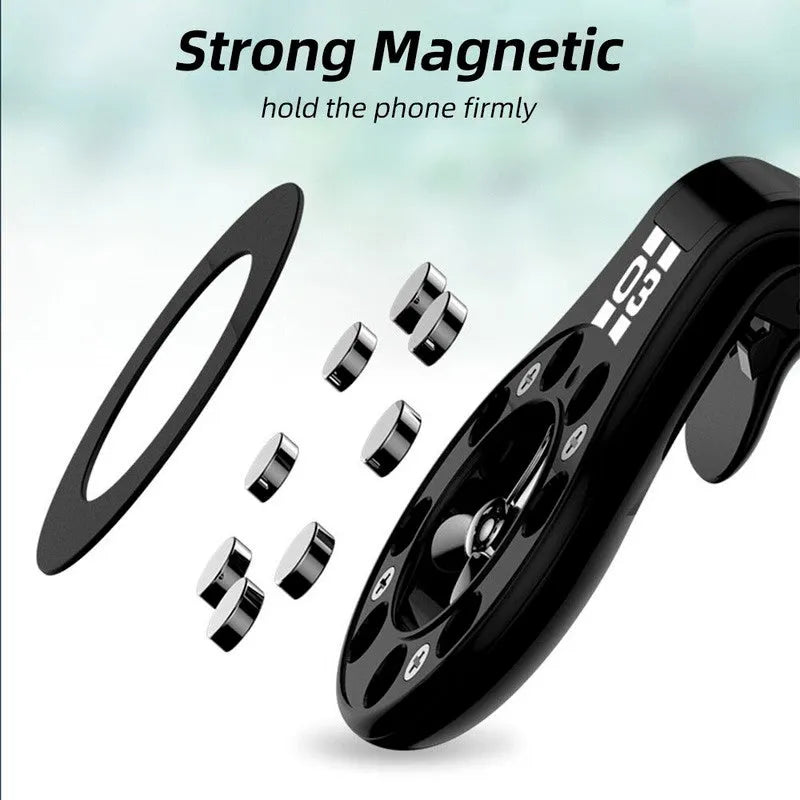 Black magnetic car phone holder attached to car air vent with phone mounted and adjustable rotation
