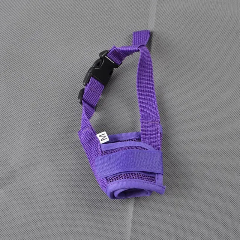 Adjustable plastic dog muzzle in multiple colours for biting and barking prevention