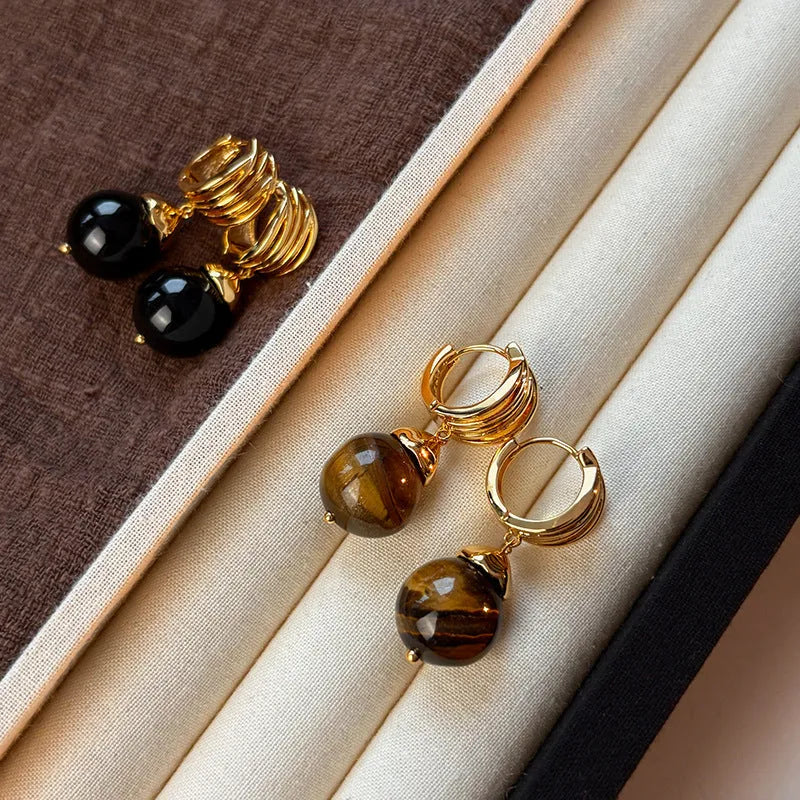 Gold plated geometric drop earrings with round brown tigereye stone, French retro style.