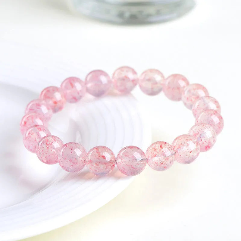 Strawberry quartz crystal bracelet with white water body geometric beads measuring 10-10.8mm