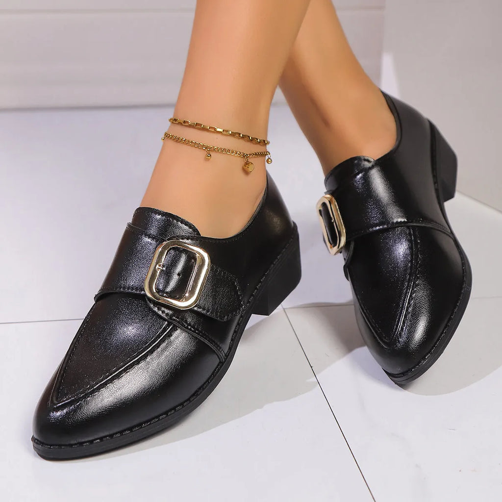 Women's flat shoes with a pointed toe and a choice of bow or buckle detail on the upper.