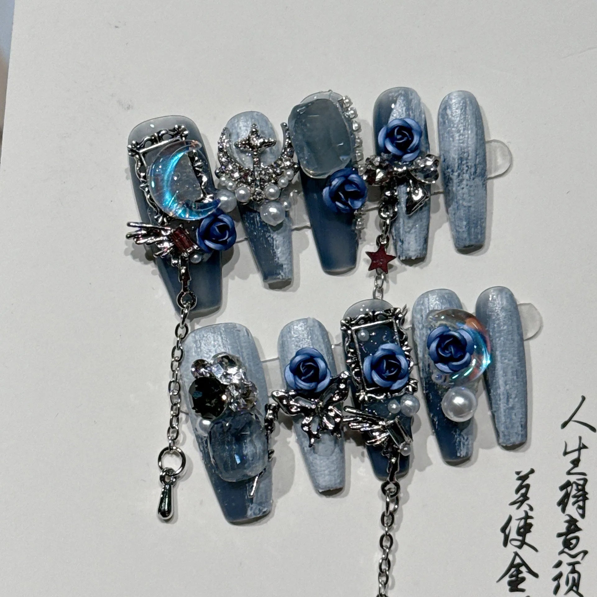Heavy industry blue evening manicure set with ornate rose pattern and plastic armour suit