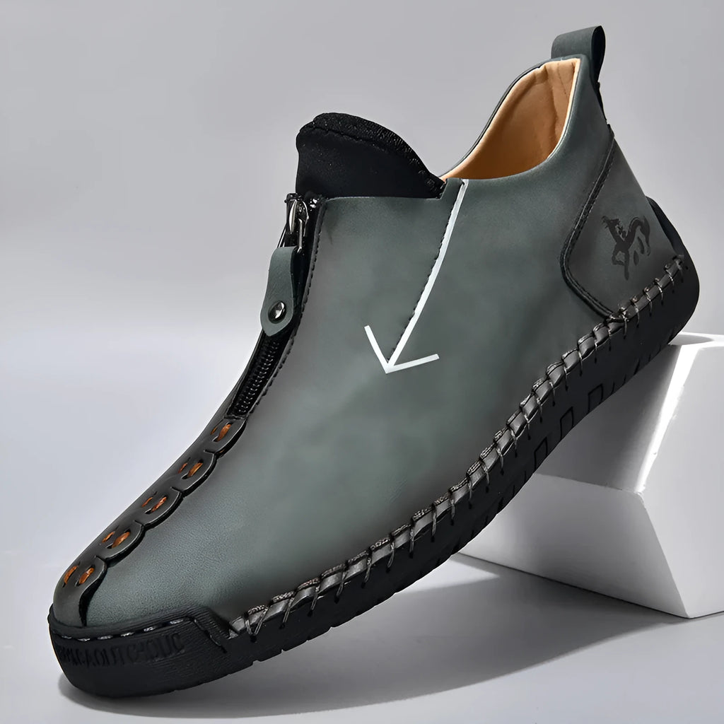 Men's black casual zip-up Martin boots with round toe and low heel on a white background.