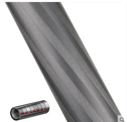 Black carbon fibre telescoping camera monopod extended to its full height.