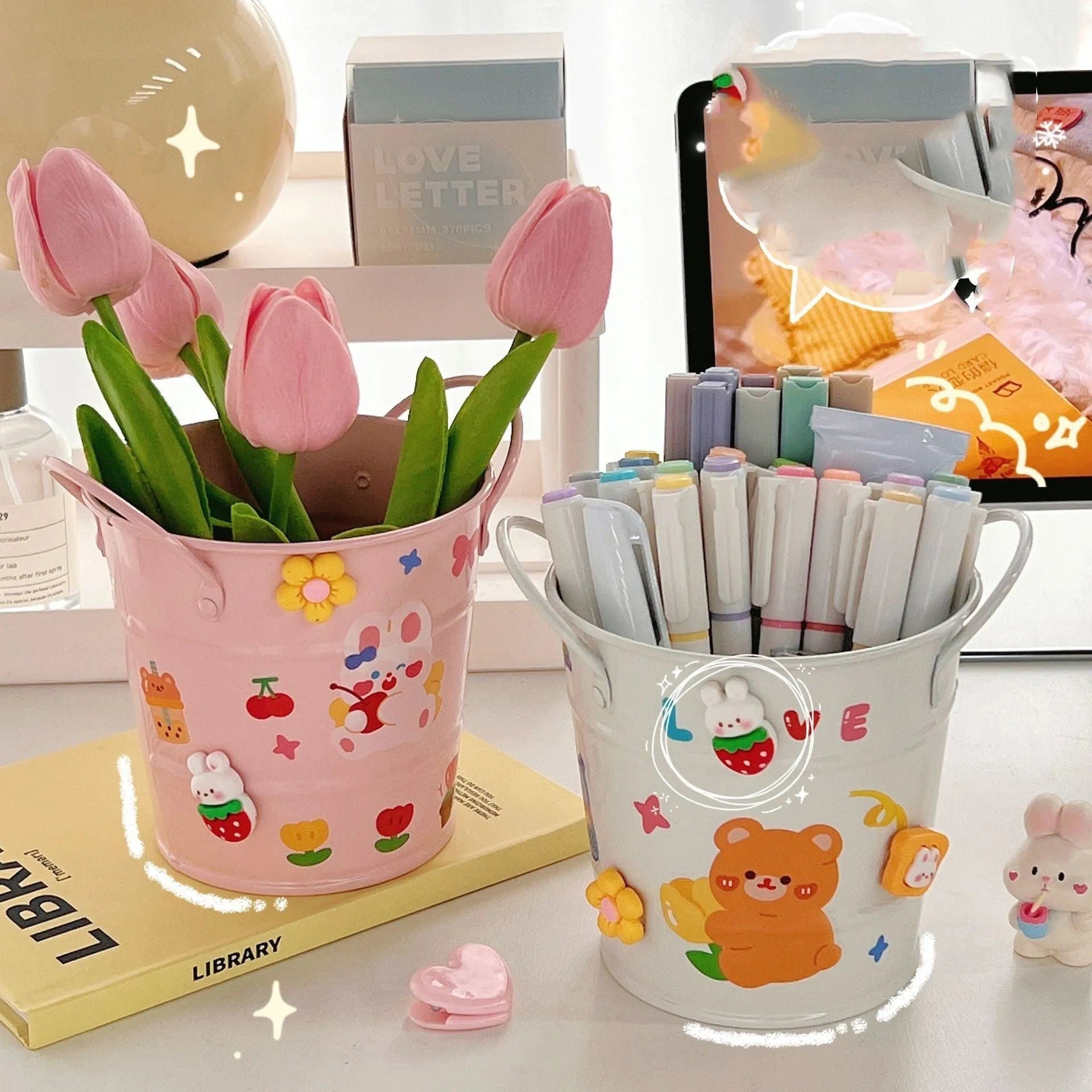 Round metal pen holder with creative iron art design in multiple colour options on a desk