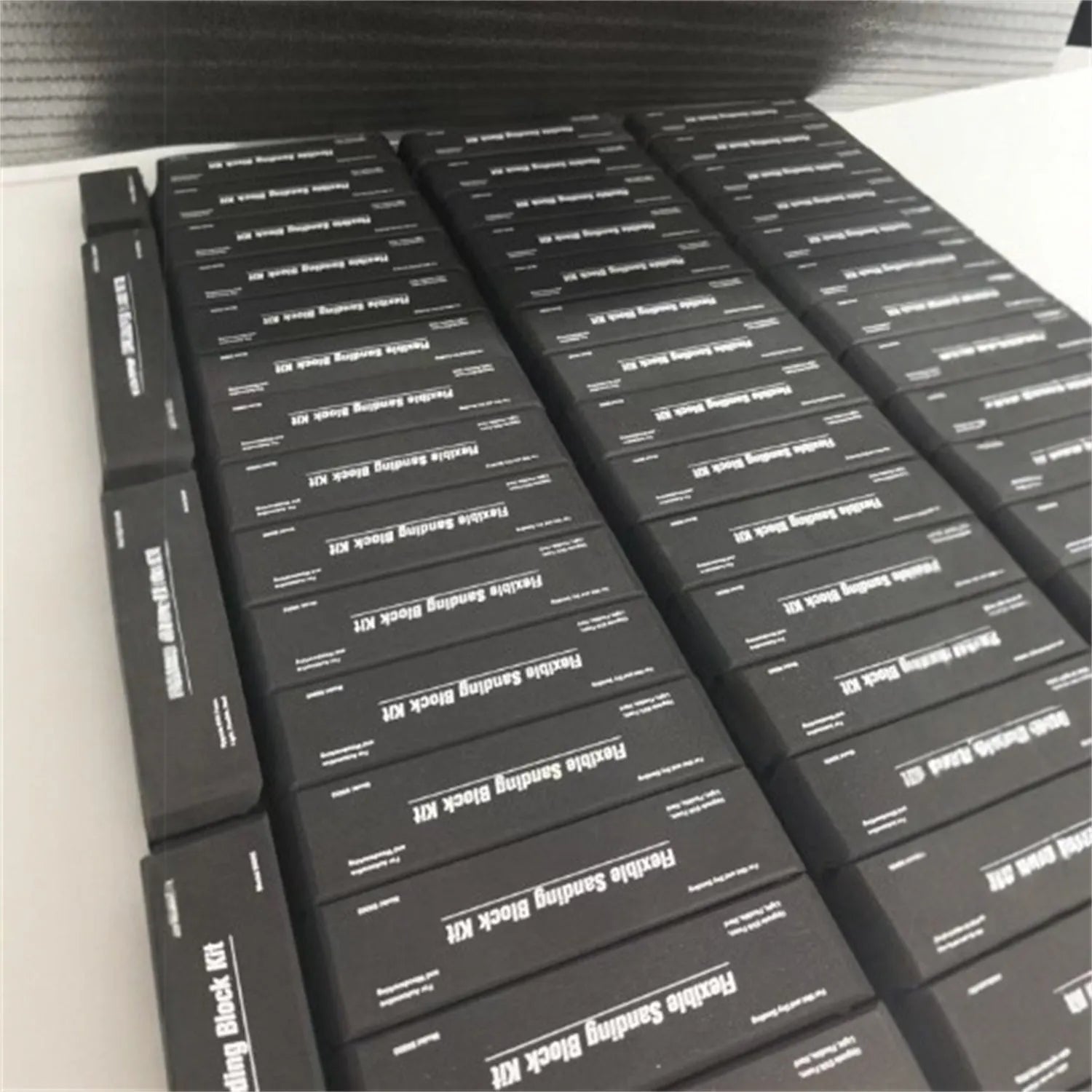 Seven black EVA frosted building blocks with metal construction