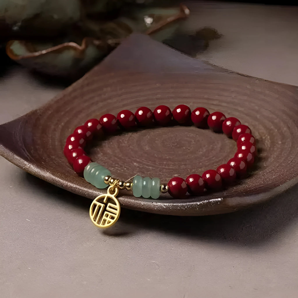 Handmade cinnabar bracelet with copper bead accent in wave shape, unisex design, available in pumpkin or brand cinnabar