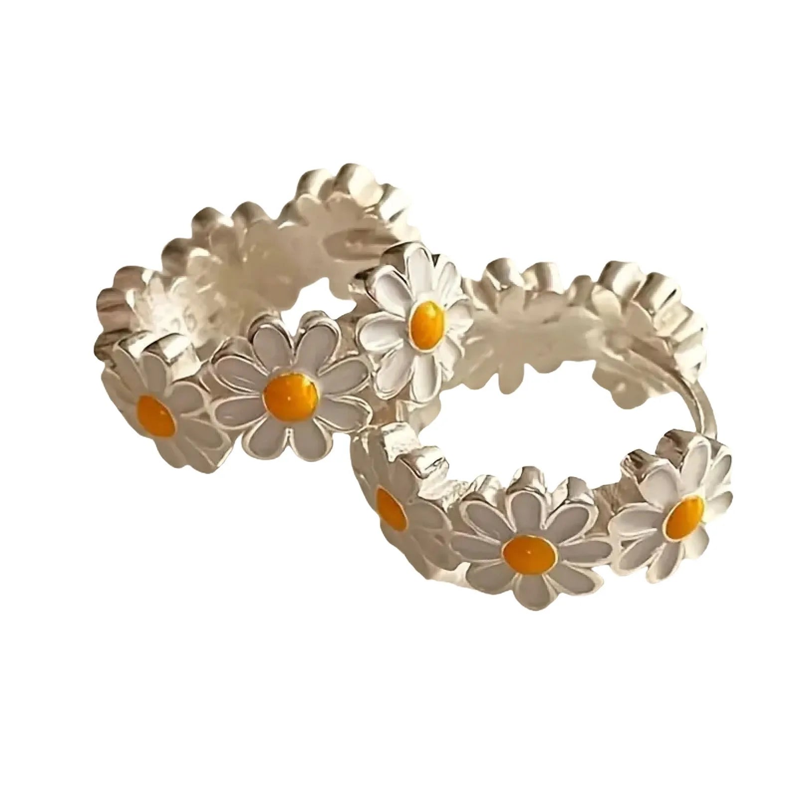 A pair of white daisy flower ring earrings with inlaid gems, shown on a plain background.