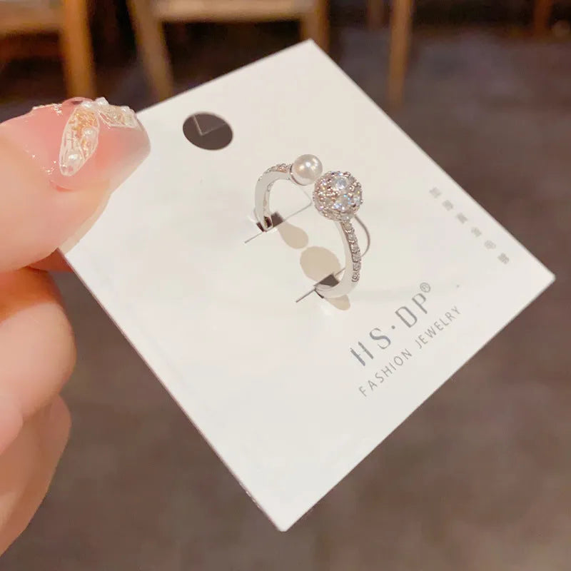 Women's adjustable open-end ring with round zircon stones and thick gold plating