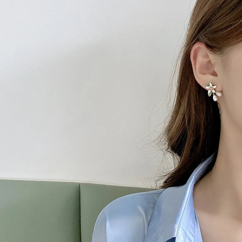 Women's camellia flower earrings in alloy with floral design and two colour options