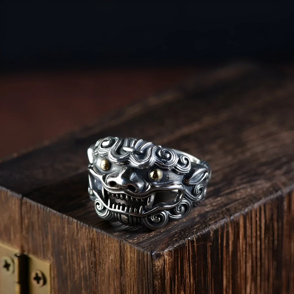 Silver open style ring with detailed jibeast animal pattern and diamond accents