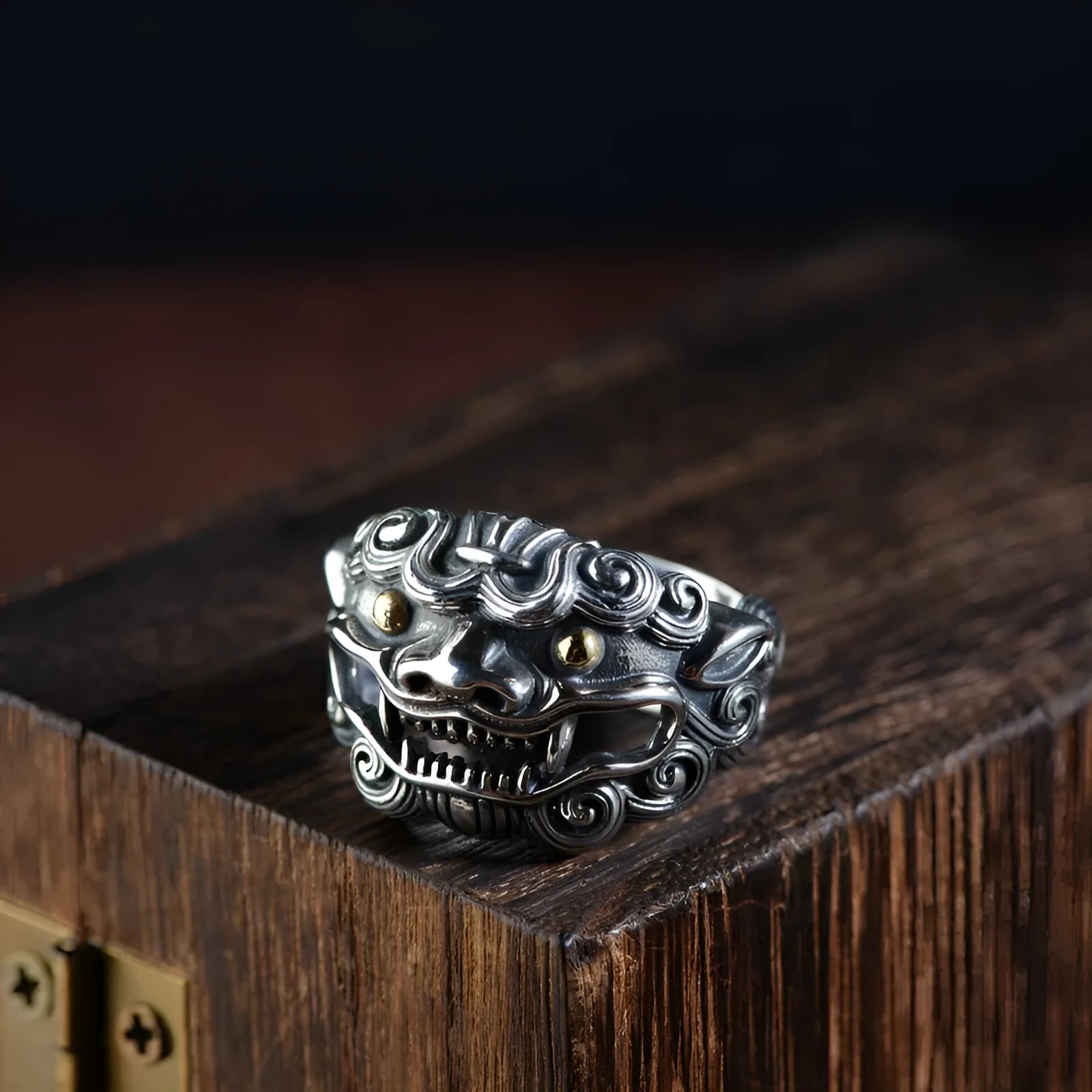 Silver open style ring with detailed jibeast animal pattern and diamond accents