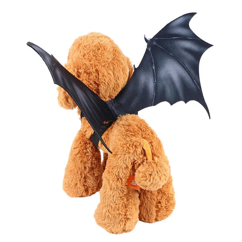 Black cloth bat wing costume for dogs and cats on a Halloween background.