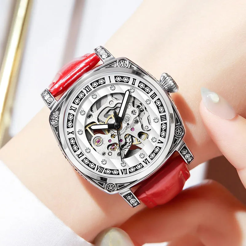Mechanical wristwatch with luminous hands on a leather strap, shown in multiple colour variants.
