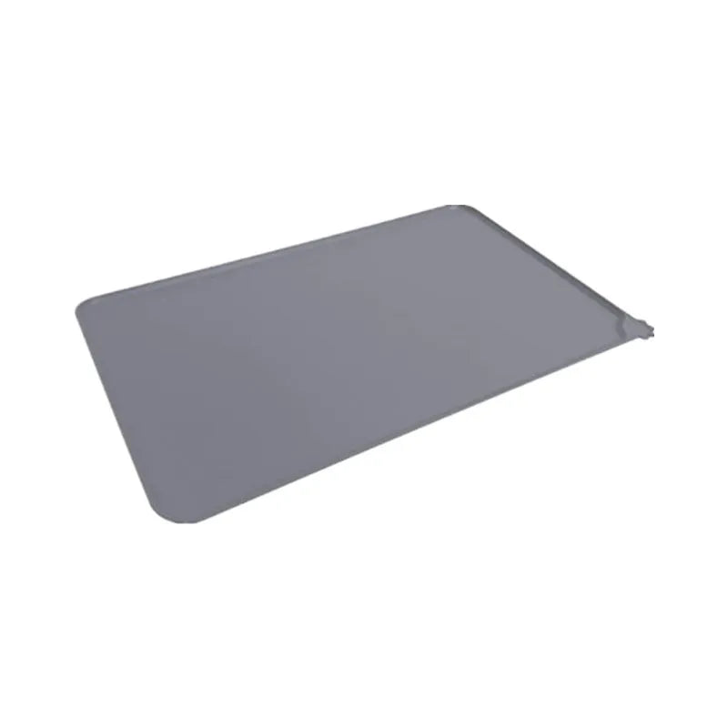 Silicone pet placemat with dog's paw design in gray, for cat and dog food bowls